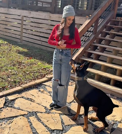 Practicing heel with my Doberman